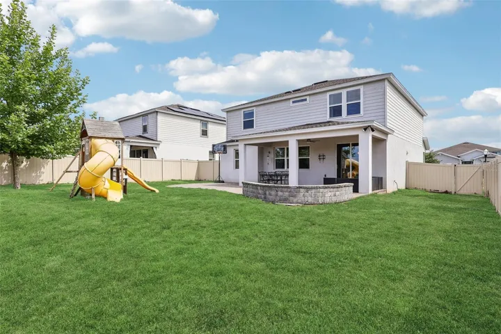 Virtually staged Back Yard -grass only