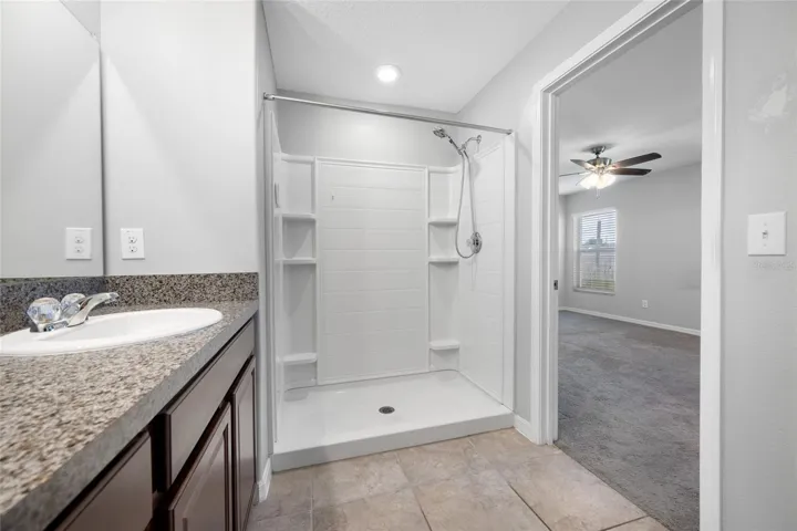 Primary Bathroom with Dual Sinks and a walk in shower