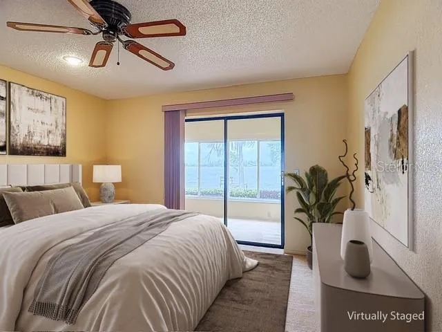 Virtual staging of Guest bedroom with a waterviw and ensuite bathroom.