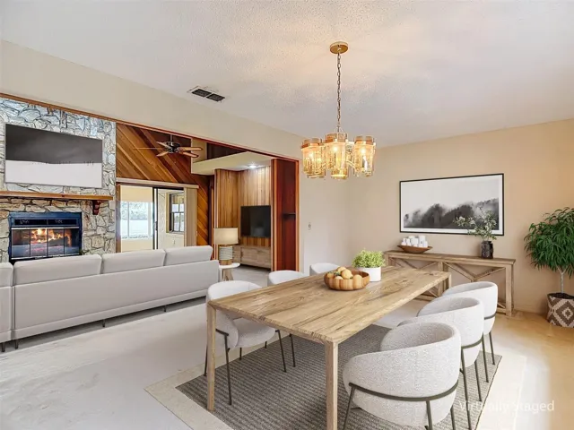 Virtual staging of 17x11 dining room adjacent to the living room.