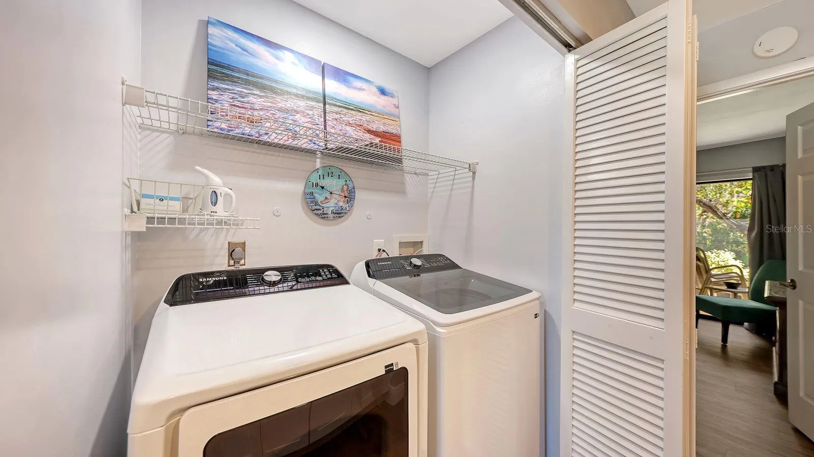 Laundry Closet with Shelving and a Brand New Washer &amp; Dryer