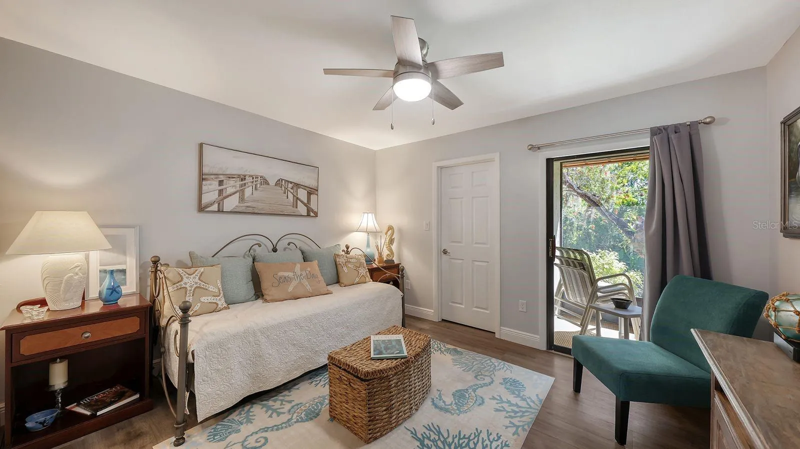Guest Bedroom with a Large Walk-in-Closet and Slider to the Lanai