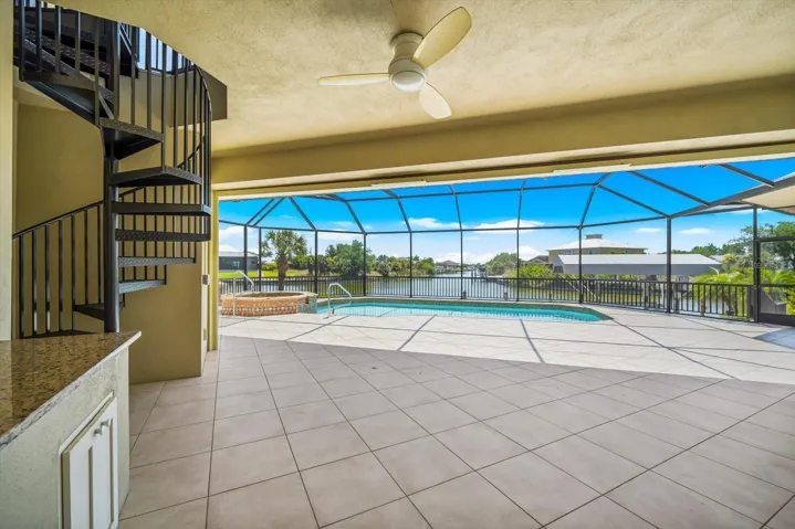Convenient Spiral Staircase Access To Both Lanai's