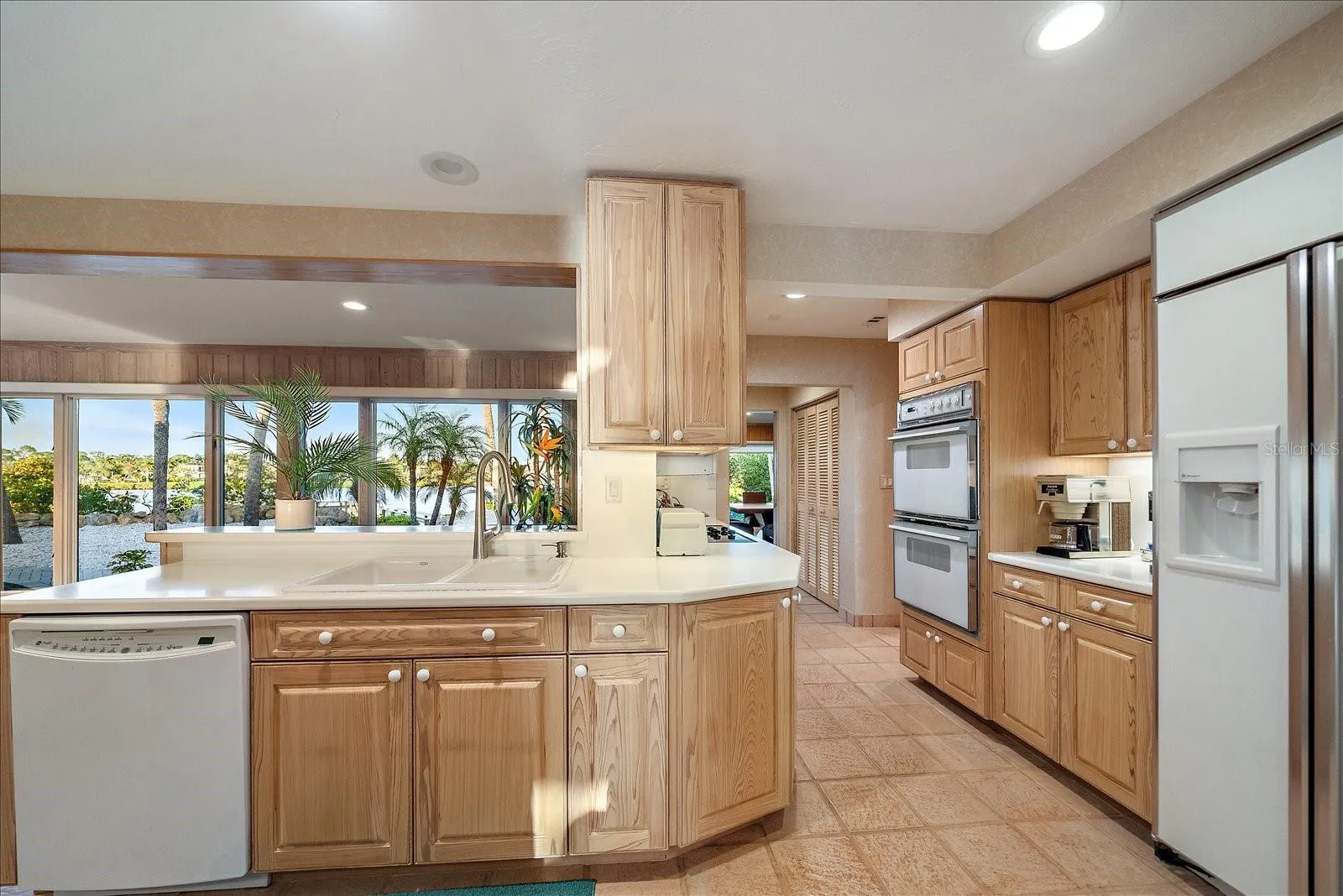 KITCHEN view facing the bay and those big beautiful windows.