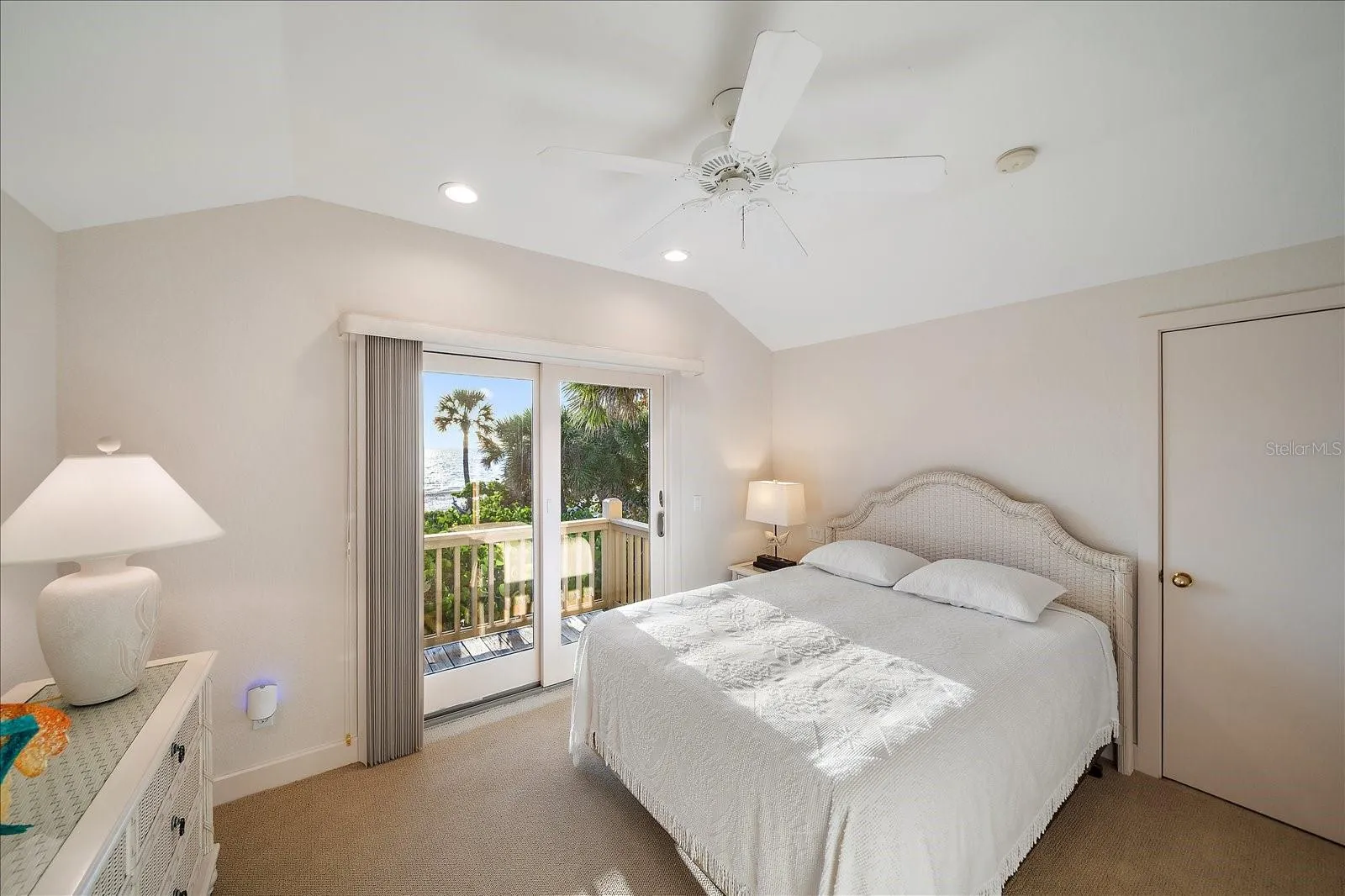 GUEST SIDE ABOVE GARAGE - gulf side bedroom - it also has two HUGE walk-in closets!