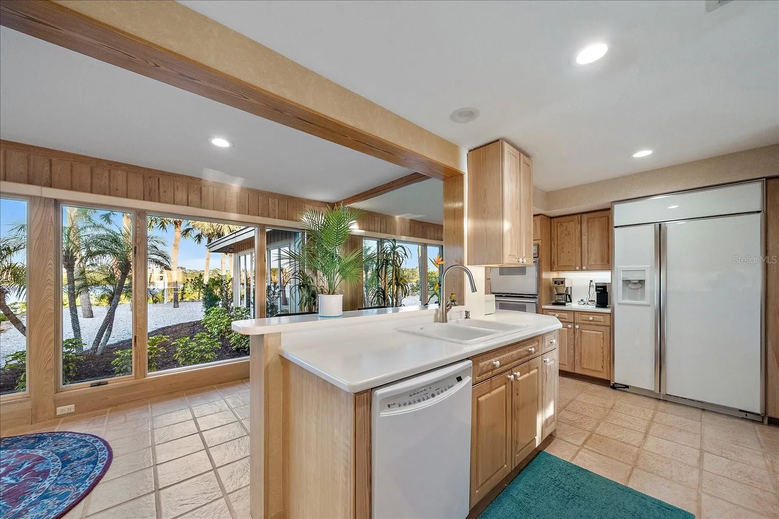 KITCHEN - notice the extra seating space by the windows!  Full length mirror, room for imagination here!