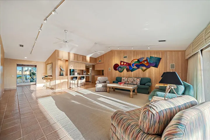 LIVING ROOM - as you can see those full length windows that open up to the bay!