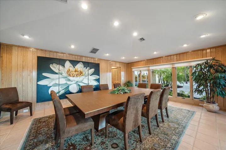 DINING ROOM - view #2 with pitched ceiling, built-ins, recessed lighting and again Lots of Cypress walls!