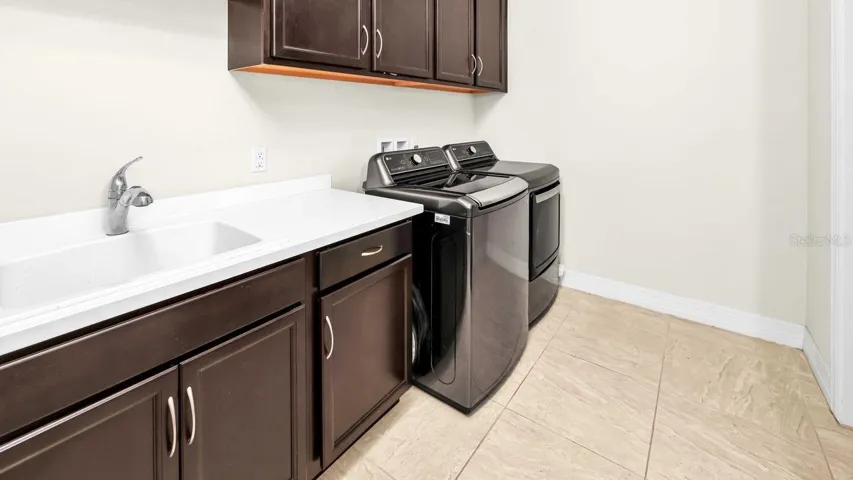 Spacious utility room with a washer & dryer