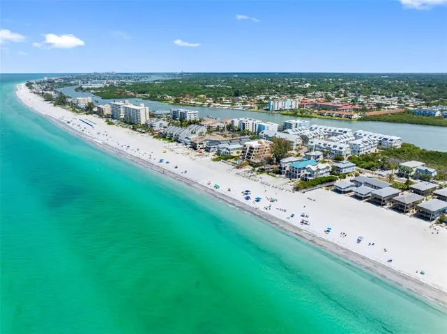 ... Indian Shores Lookign North from Waterside.. Small Town Runs about 3.5 Miles along the Coast .. 22 Mile Due West From Tampa Airport.. Small, intimate Beach community with underground utilities for safety & aesthetics, police department and renowned restaurants, and is accessible and bikeable.