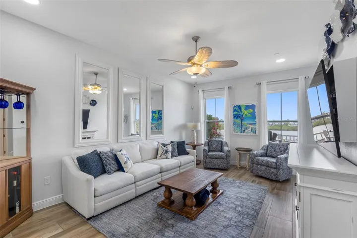 .. Calming Direct Water Views from Living Room Area. There is a 20 X 6 Waterfront Balcony off Living Room . Perfect to run down and see the baby Dolphins up close.