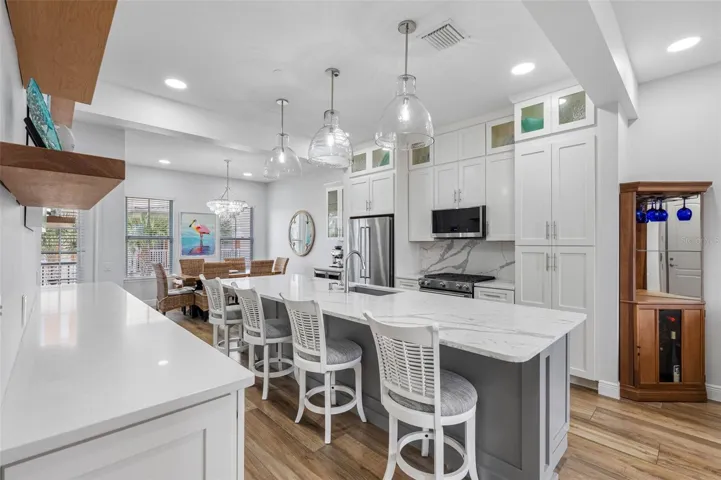 ..Sellers have updated The Townhome in the last two years with a $120,000 Upgrade.  DEsigner Feature Sheet Included with Upgrades. New Appliances: Kitchen Aid 3 Door Refrigerator, Dishwasher, A 5 Burner Gas Stove for the Chef & LG/ Thin Q Microwave/ Convention/ Air Fryer.