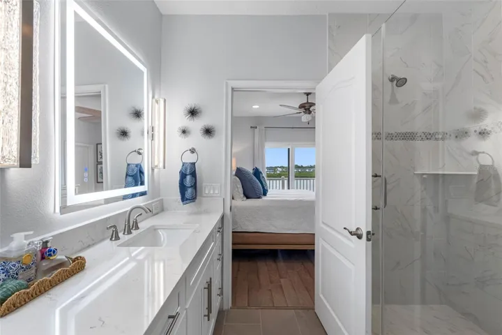 ...8.8 X 8.9 Updated Master Bath .. Walk in Shower - Double Vanirty - Privacy Room.  New Lighting..Looking Out ..Townhome is in Immaculate shape.