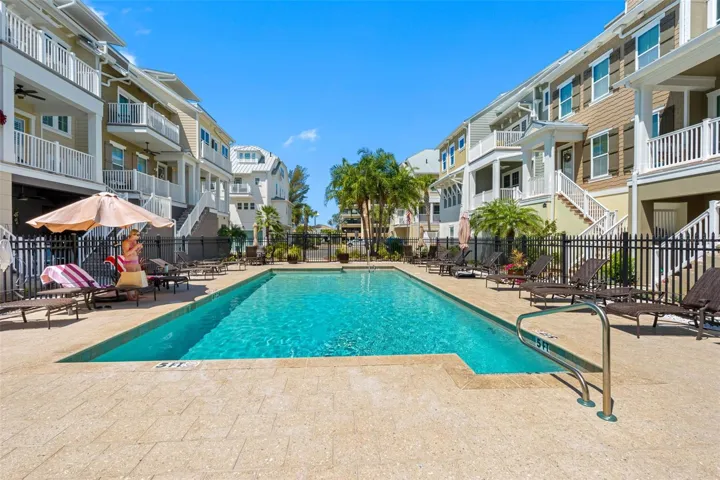 ... Heated Pool is Located in Center of Community For Easy Access. Plenty of Lounging Areas & Guest Parking. Perfect Family Beach Getaway..