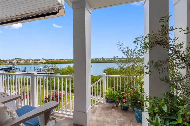 ...20 X 6 Balcony off Living Room Area - Floor Level #2... Owners Installed a Retractable Awning off Balcony. Coastal Living Florida Style .. 300 Steps to Beach Right across the street. The Best of Both Worlds as they say.