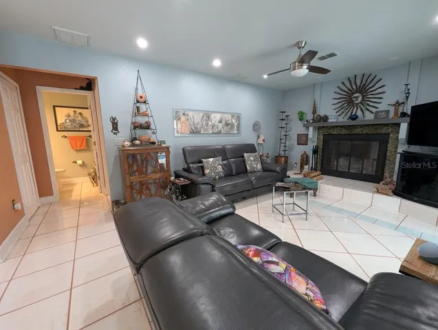 View to half bath and laundry area with entry to garage
