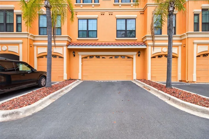 Double garage with two additional spaces