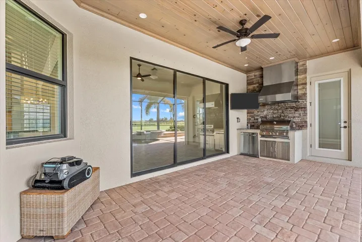 Lanai with Outdoor Kitchen and golf course view