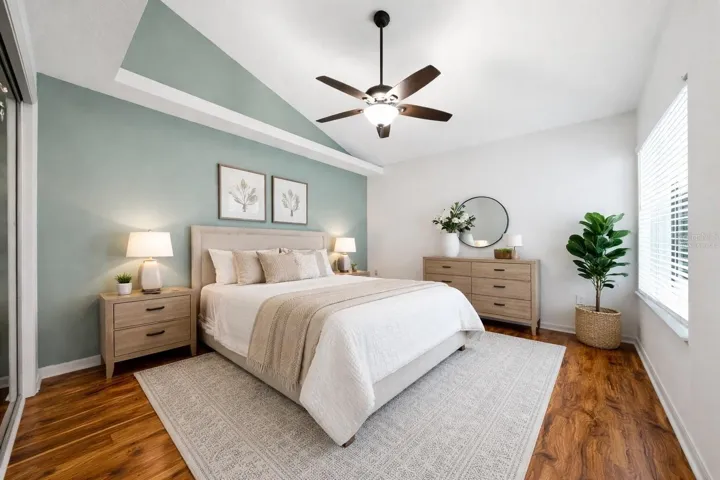 "Virtually Staged"  bedroom to the right after the hall way.