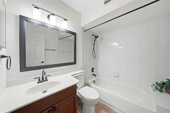 Bathroom next to second bedroom