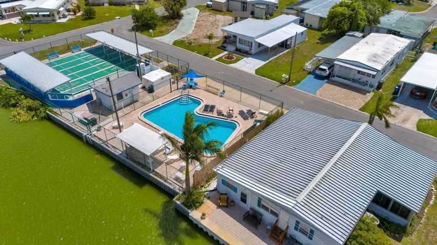 Aeriel view showing pool and shuffleboard