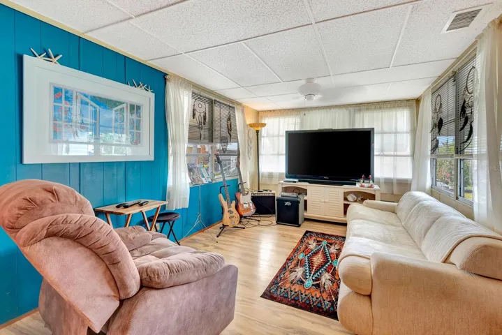 Good angle of living area, lots of windows, natural light.