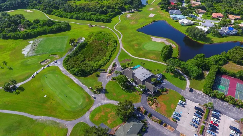 Aerial of clubhouse, tennis courts no longer in use.
