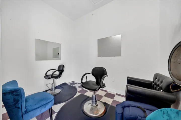 Room with two barber chairs