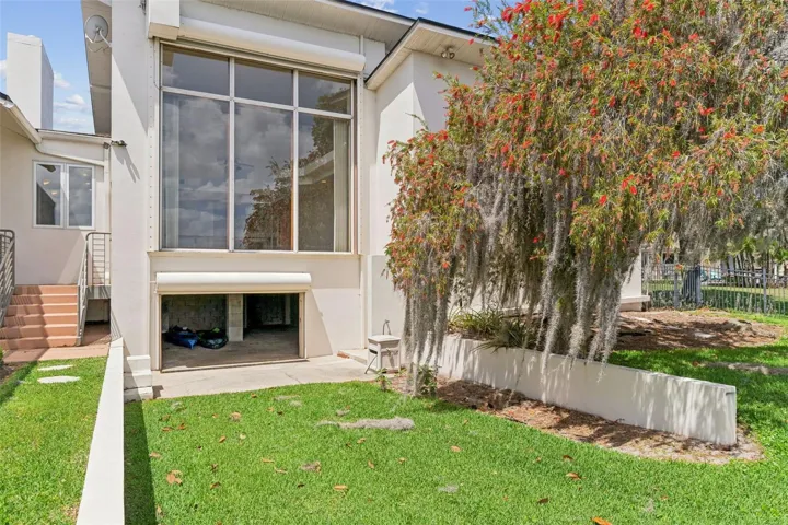 Lower-level garage space for boat gear, kayaks, paddle boards, trailers, and lakefront equipment.