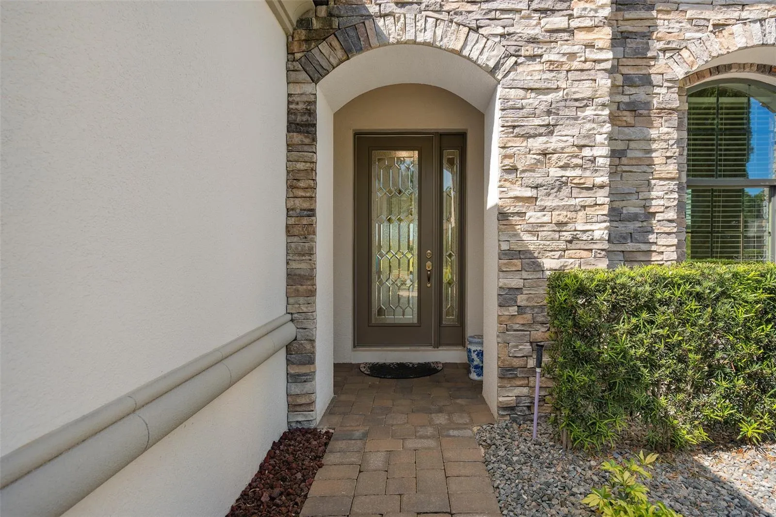 Front Entrance featuring a Stone Facade