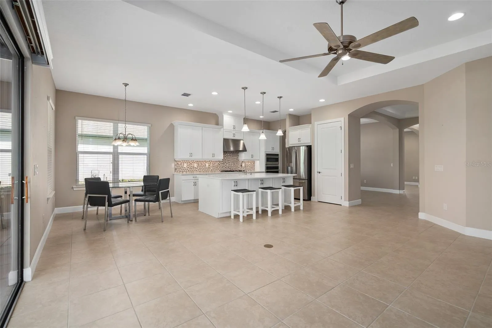 Family Room looking toward the Gourmet Kitchen. This is a Great area to entertain.