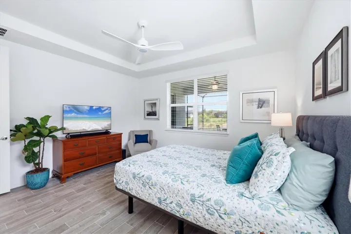 Primary bedroom with coffered ceiling