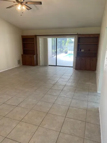 Living Room w/ built in cabinets