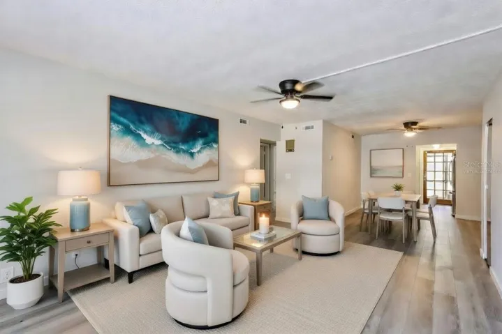Virtually Staged Living to Dining Area