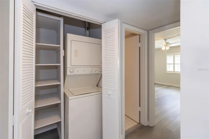 Stacked Washer Dryer in Unit! located in hallway