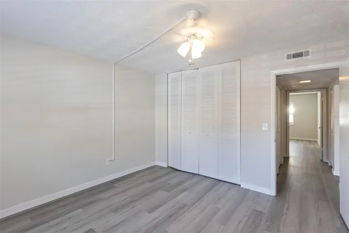 Guest Bedroom closet and to hallway