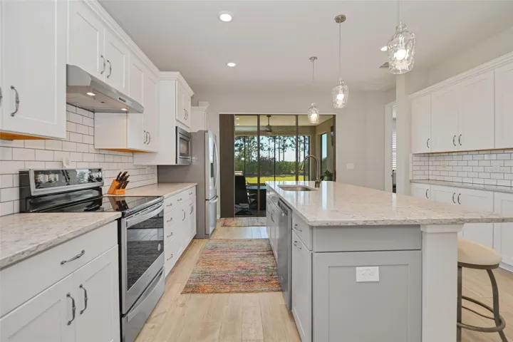 Kitchen with Additional Cabinets and Quartz Countertops