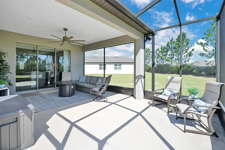 Extended Screened Lanai + Cage w/ included Flatscreen TV & Large Ceiling Fan on Expansive Pie-shaped Lot