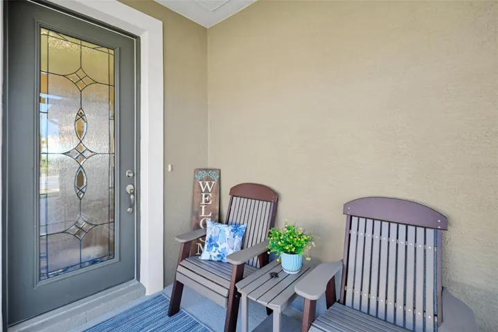 Screened Front Porch with Upgraded Front Door