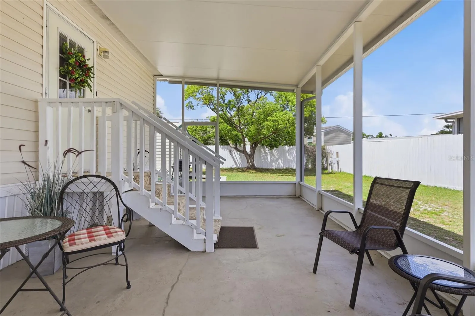 Relax on the lovely screened porch