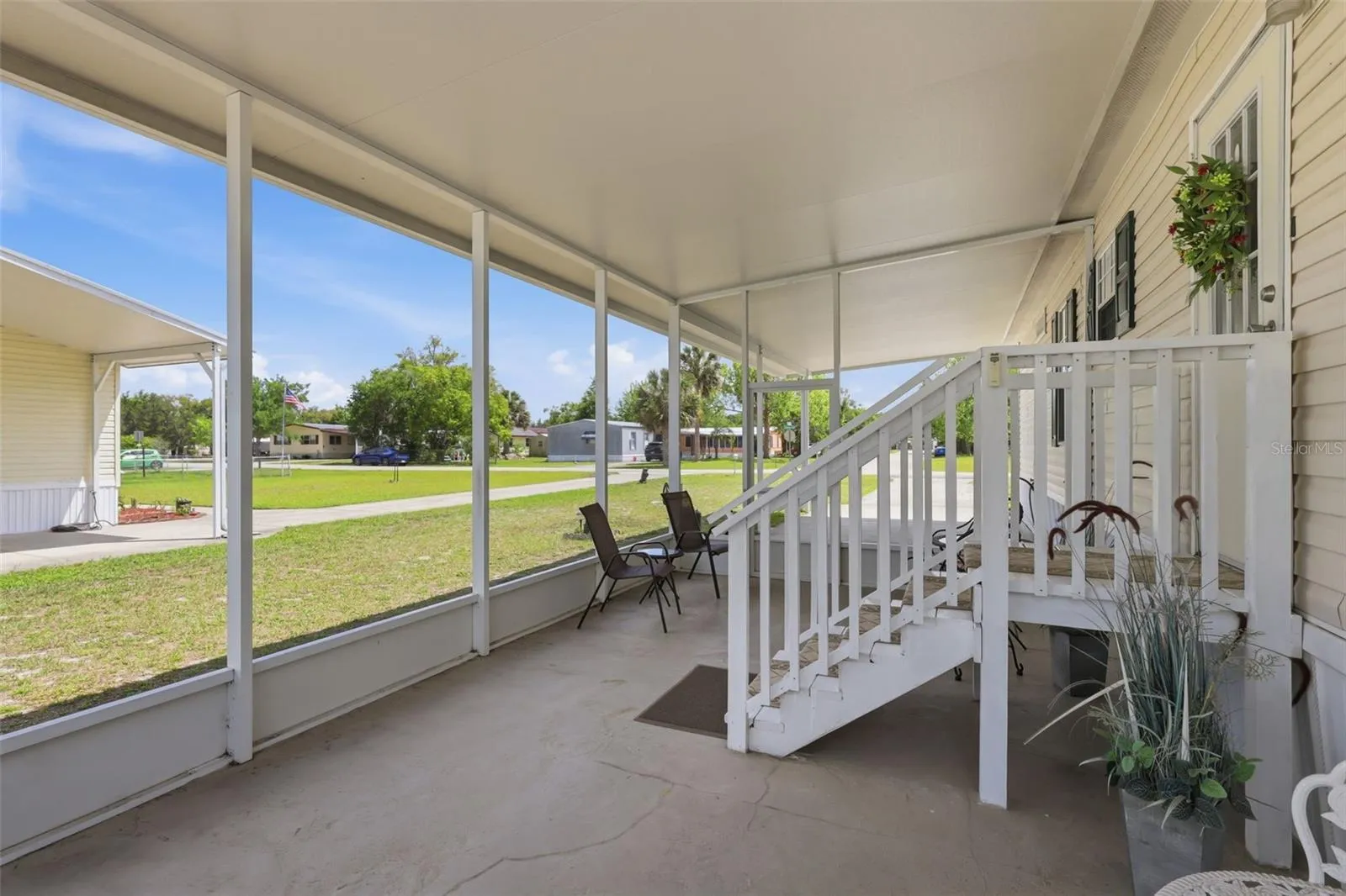 Relax on the lovely screened porch