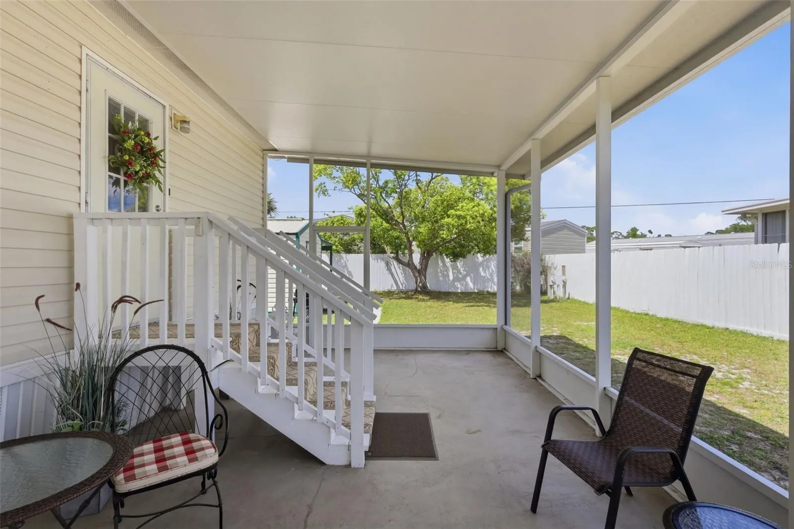 Relax on the lovely screened porch