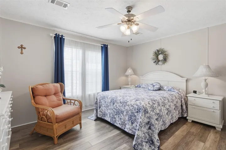 Large primary bedroom w/ upgraded LVP flooring