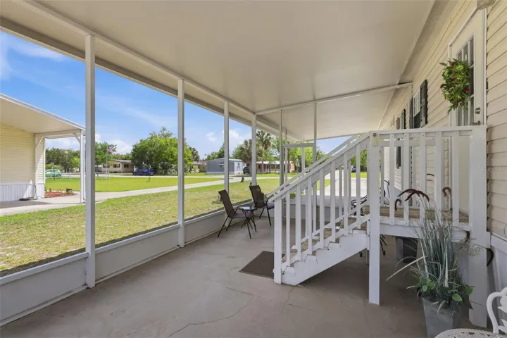 Relax on the lovely screened porch