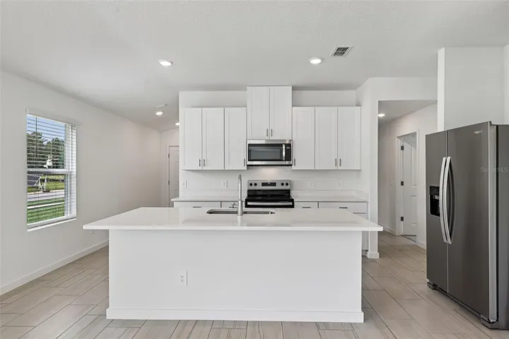 The interior photos are of another home with the same floor plan and interior finishes. Some details may vary