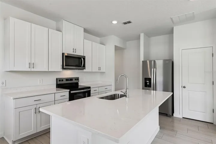 The interior photos are of another home with the same floor plan and interior finishes. Some details may vary