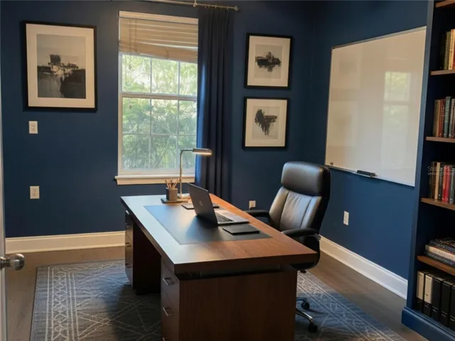 Virtually staged guest bedroom #3/office with flooring
