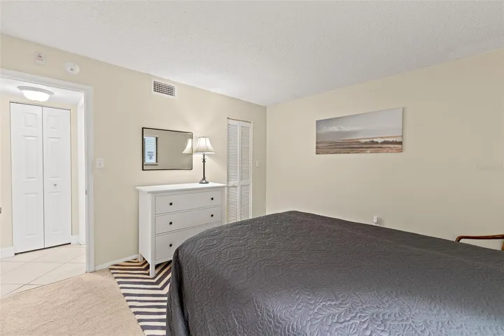 Bedroom with walk-in closet — Windward East condo, Cocoa Beach