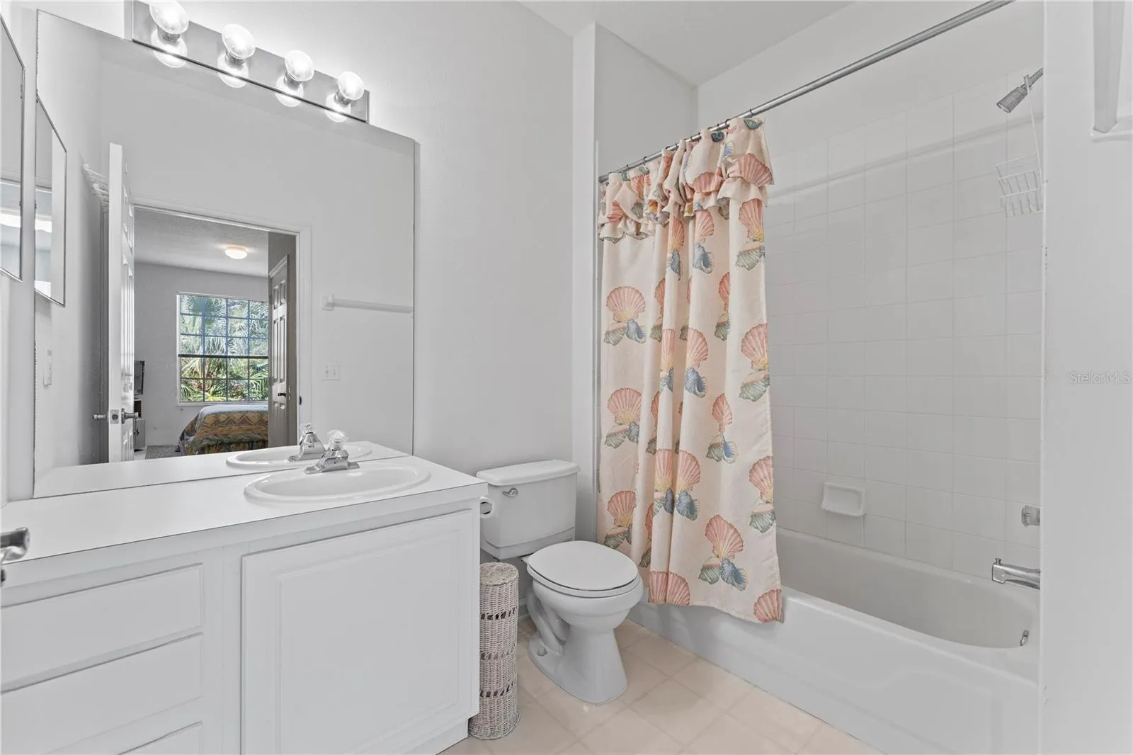 Primary bathroom with tub and shower