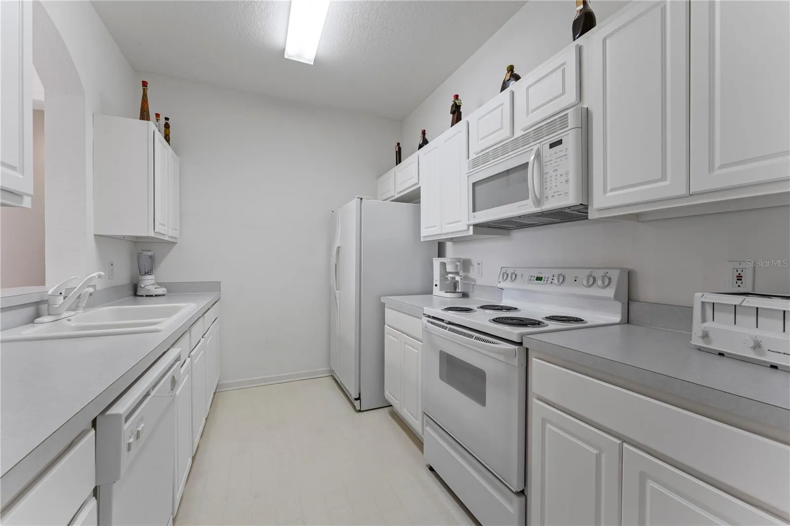 The kitchen comes fully equipped with all appliances included